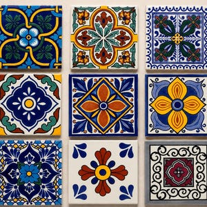 May include: A collection of nine square ceramic tiles arranged in a three-by-three grid. Each tile features a distinct, colorful geometric and floral pattern in shades of blue, yellow, red, green, white, and black, showcasing intricate symmetrical designs.