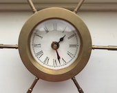 Captains wheel nautical decoration, brass, clock does not keep acurate time