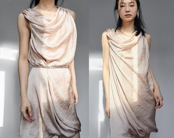 Ligh peach salmon pink rose gold nude iridescent metallic draped layering greek goddess deconstructed bias cut asymetric disco dress silky