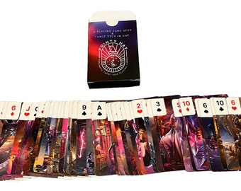 May include: A deck of playing cards and tarot cards combined, featuring a black box with the text "A PLAYING CARD DECK & TAROT DECK IN ONE" and "POINTY HAT". The cards are fanned out, displaying various colorful, detailed illustrations and standard card suits and numbers.
