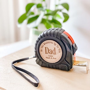 Personalized tape measure with wrist strap