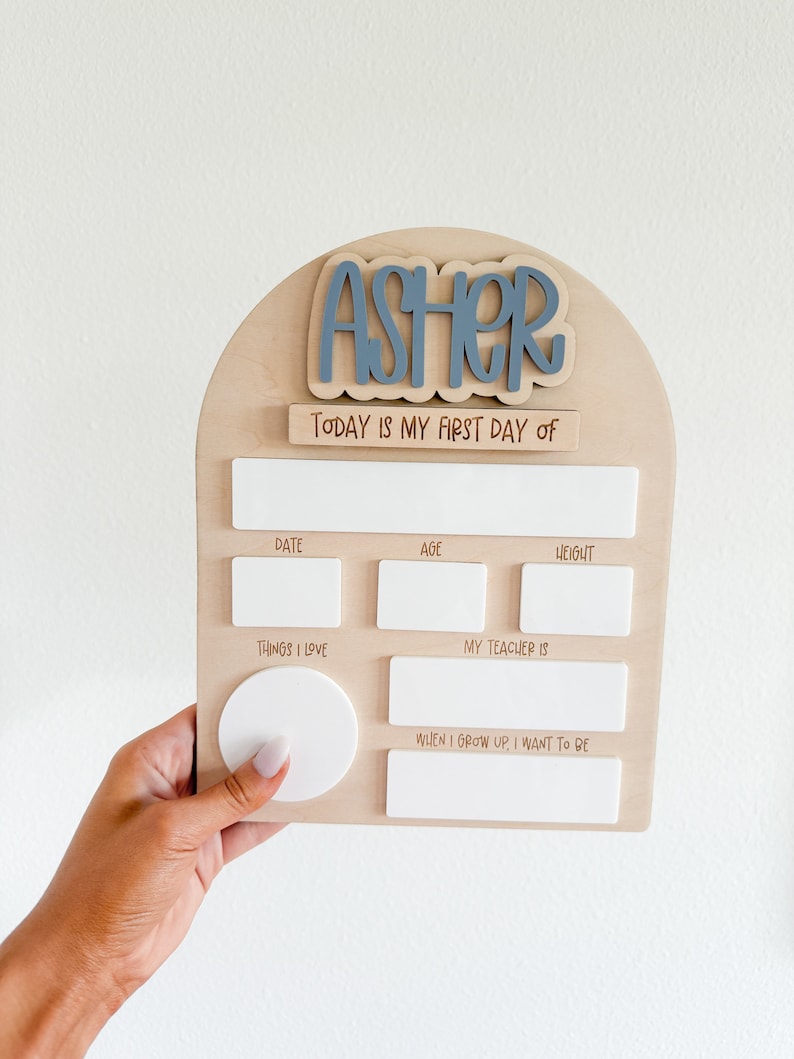 Interchangeable and reusable first/last day of school sign.  Features magnetic interchangeable names in your choice of color, velcro first/last day of school pieces and white dry erase areas to fill in milestones!