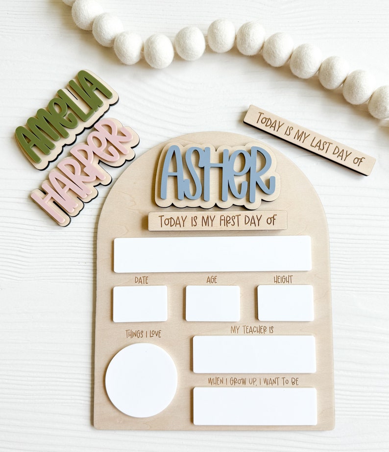 Interchangeable and reusable first/last day of school sign.  Features magnetic interchangeable names in your choice of color, velcro first/last day of school pieces and white dry erase areas to fill in milestones!