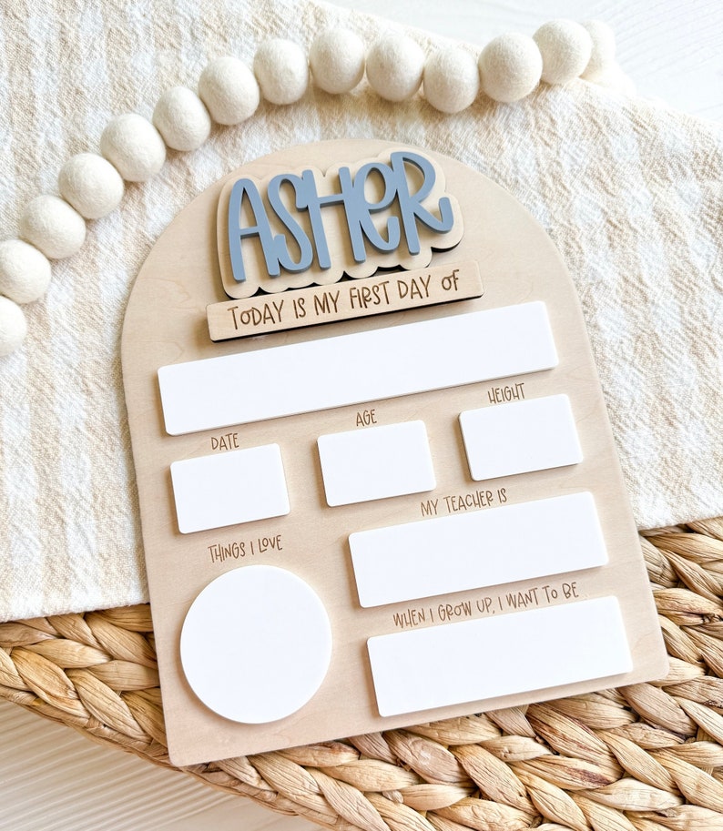 Interchangeable and reusable first/last day of school sign.  Features magnetic interchangeable names in your choice of color, velcro first/last day of school pieces and white dry erase areas to fill in milestones!