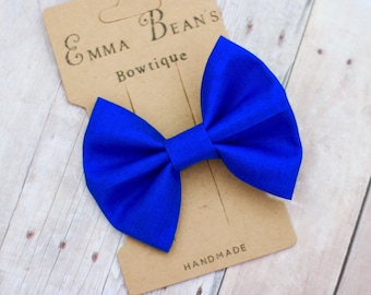 Royal blue hand tied bow nylon headband or clip