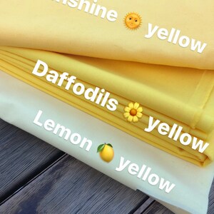 May include: Three fabric swatches in shades of yellow, labeled "Sunshine yellow", "Daffodils yellow", and "Lemon yellow".