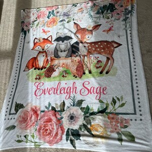 customer review picture of the personalized woodland friends baby blanket