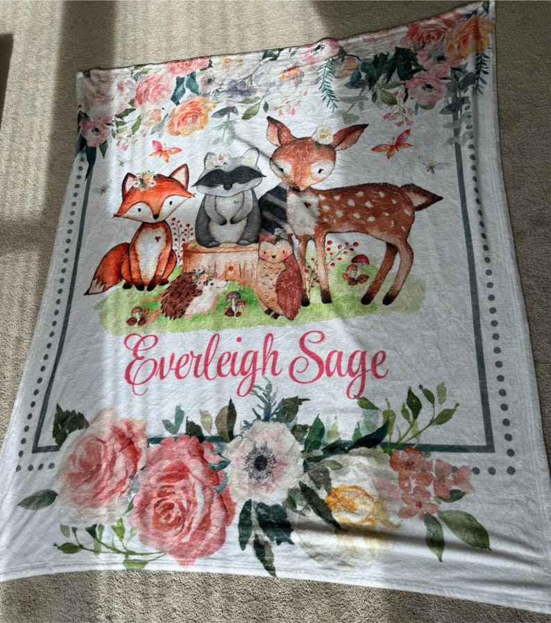 customer review picture of the personalized woodland friends baby blanket