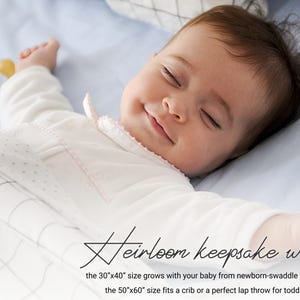 a baby is laying down on a bed with the writing Heirloom Keepsake Worth