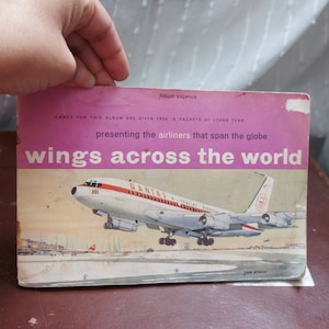 Vintage, präsentiert die Flugzeuge, die den Globus überspannen, Flügel auf der ganzen Welt, Flugzeuge, Album des Sammlerstücks, Tee, Karte, Lyons Tees, Vater
