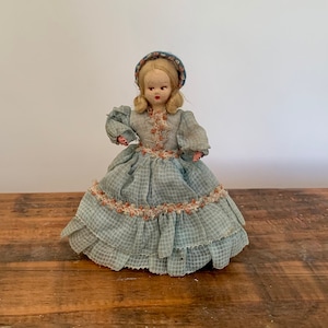 Vintage, 1:12th Scale, Dolls House, Caco, German, Rubber, Wire, Dollhouse, Figure, Girl, Child, In Original Clothing, Purple Dress, Shoes