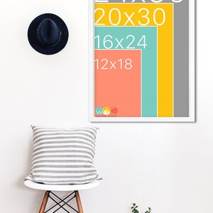 May include: A white frame with a colorful graphic showing different sizes of prints. The sizes are 24x36, 20x30, 16x24, and 12x18. The graphic is in shades of gray, yellow, teal, and coral.