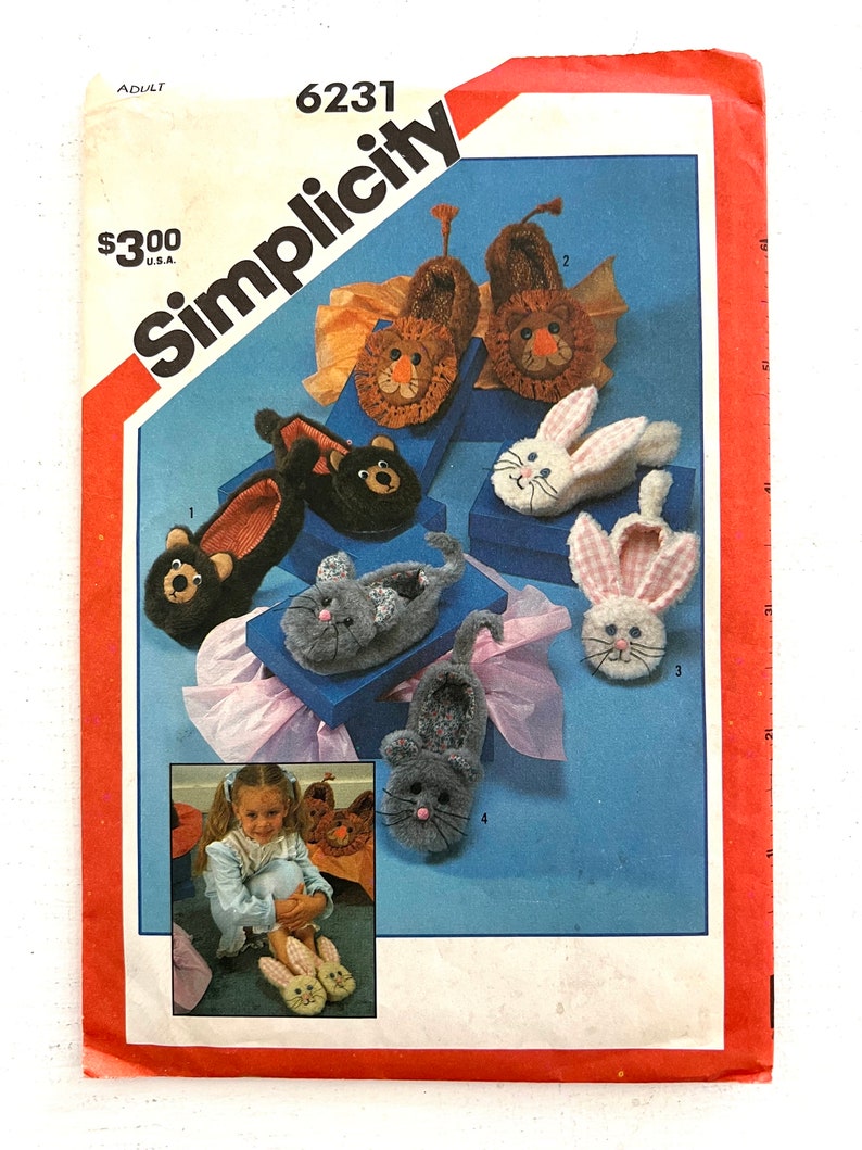 May include: Simplicity sewing pattern number 6231 for adult-sized animal slippers. The pattern includes instructions for making lion, bear, bunny, and cat slippers. The pattern is $3.00.