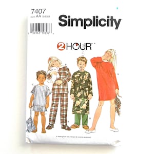 May include: Simplicity sewing pattern number 7407 for children's pajamas, robes, and a dress. The pattern includes instructions for sizes 3, 4, 5, and 6. The pattern is labeled "2 Hour" indicating a quick sewing project.