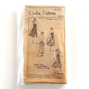 May include: Vintage sewing pattern for a dress with four illustrated ways to tie. The pattern is for misses' sizes XS, S, M, L, and XL. The pattern is from Paula Patterns and costs $4.50. The pattern number is 4412.