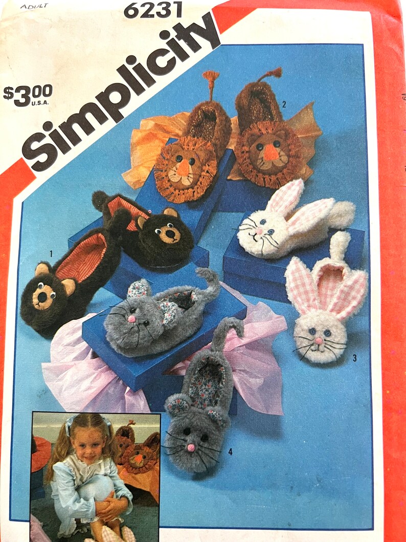 May include: A Simplicity sewing pattern for making animal slippers. The pattern number is 6231. The pattern includes instructions for making lion, bear, bunny, and cat slippers.