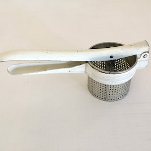 Vintage potato ricer food press white metal kitchen utensil farm house decor