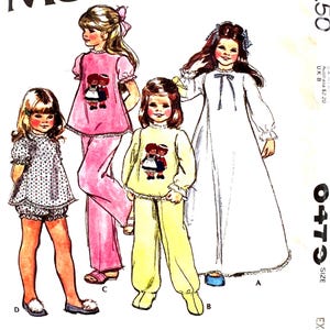 May include: Vintage McCall's pattern featuring four children's sleepwear designs. The illustrations include a pink pajama set, a white nightgown, a yellow pajama set, and a dotted romper. The pattern is from 1976.