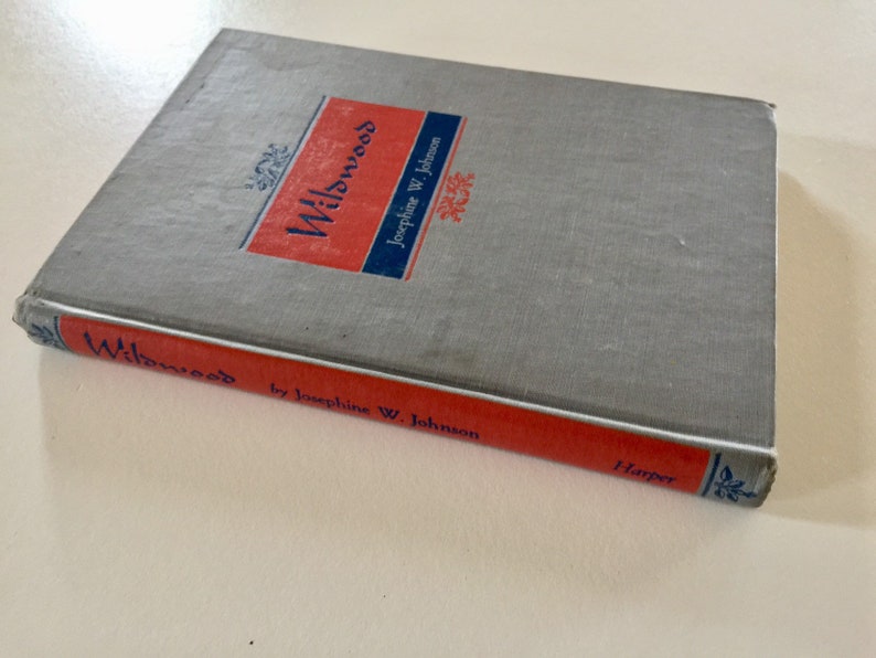 May include: A gray hardcover book titled "Willows" by Josephine W. Johnson. The book has a red spine with the title and author's name printed in blue. The publisher, Harper, is printed in blue on the bottom of the spine.