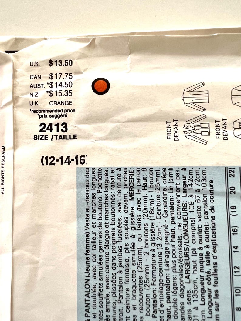 May include: A sewing pattern for a women's pants and jacket. The pattern is for sizes 12, 14, 16, 18, 20, and 22. The pattern is orange and has a price tag of $13.50.