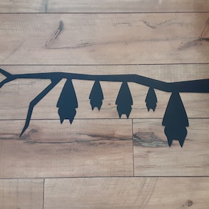 Bat family on branch