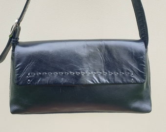 Black leather shoulder bag.  Proudfoot small short handle purse