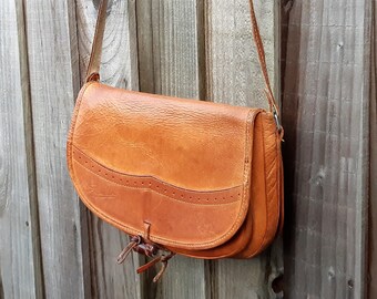 brown leather messenger saddle bag, A Pietri cross body satchel cartridge bag