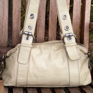 Tula store crossbody bags