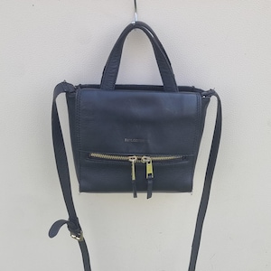 Bolso bandolera mini de cuero negro vintage de Paul Costello, bolso tipo cartera con asa superior.