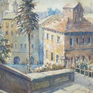 May include: Watercolor painting of a European cityscape with buildings, a palm tree, and a street lamp. The buildings are painted in shades of yellow, brown, and blue. The artwork is signed in the lower right corner.