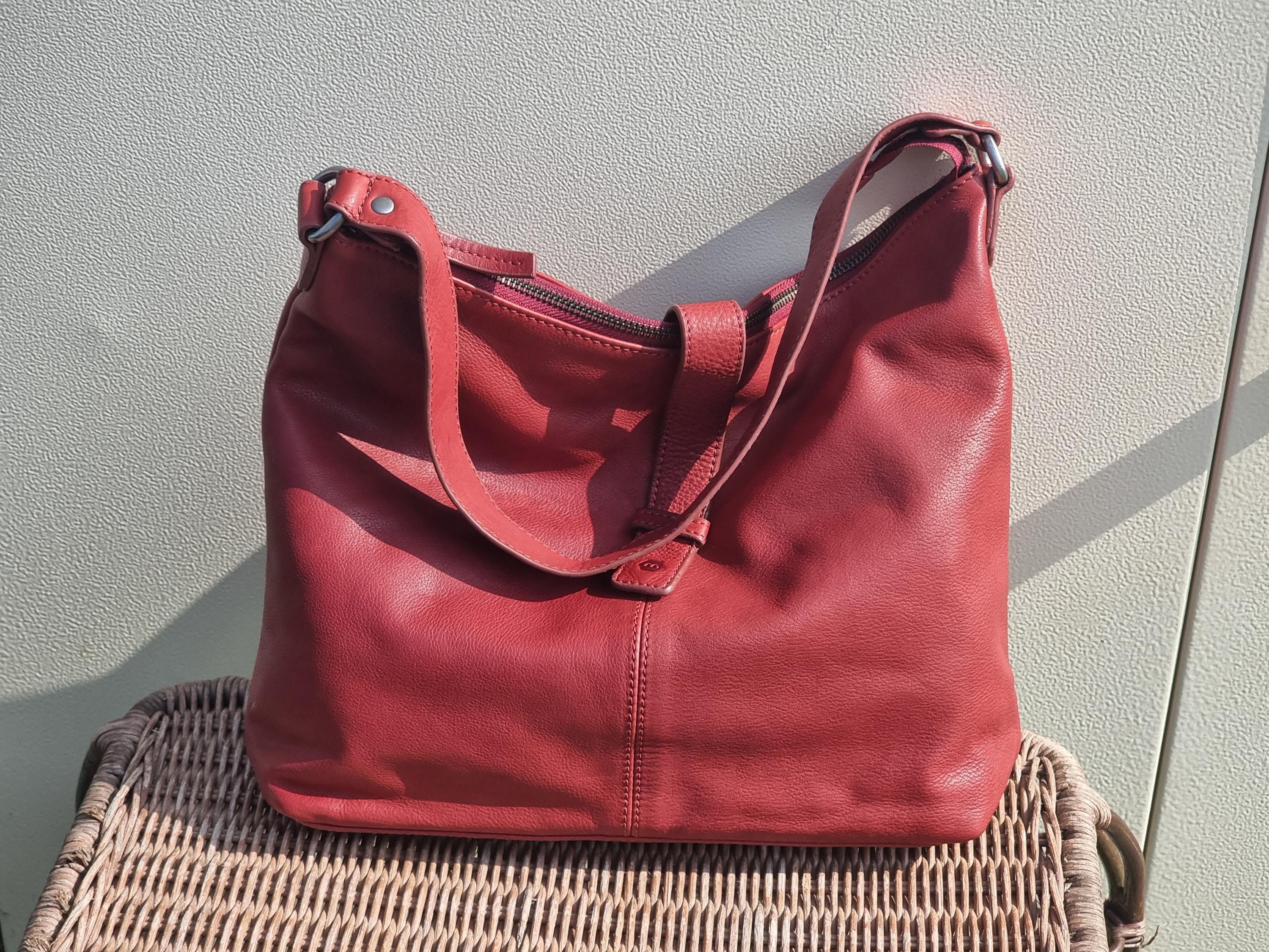 Dark red leather purse deals