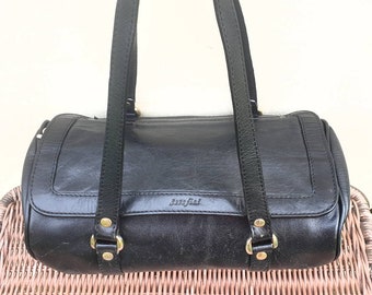 Serafini Black leather shoulder bag. Top handle barrel shape purse