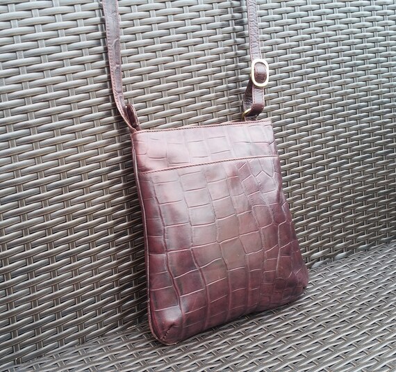 oxblood messenger bag