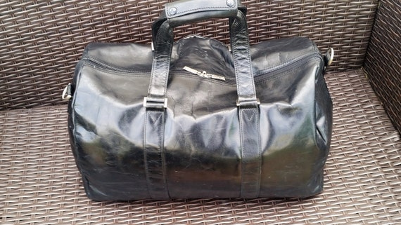 black leather holdall bag