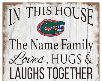 Letrero de Florida Gators personalizado en esta casa, 11 "x 19"