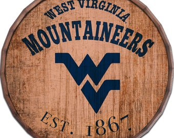 May include: A wooden barrel-shaped sign with the text "West Virginia Mountaineers Est. 1867" and a blue and white "W" logo.