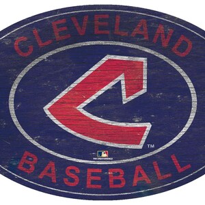 May include: A blue and red wooden sign with the text "Cleveland Baseball" and a red "C" logo. The sign has a distressed, vintage look.