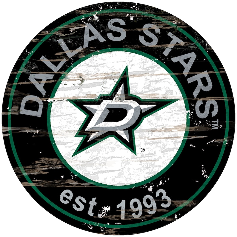 May include: Round wooden sign featuring the Dallas Stars logo. The logo is a green star with a white 'D' inside, set against a white circle. The sign has a distressed, weathered look with the text "DALLAS STARS" and "est. 1993".