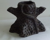 Folk art sewer tile clay tree trunk pot