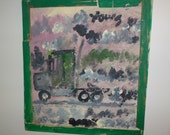 Outsider artist Purvis Young painting with found materials