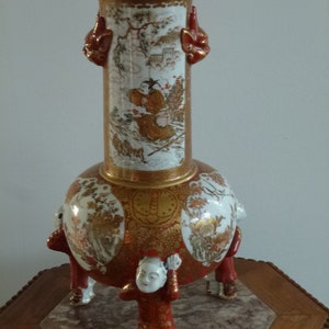 Kutani vase with dragon head mask