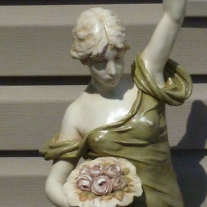 Royal Dux lady with flowers statue