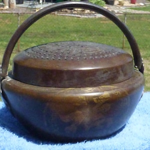 Qing bronze w/gold inlay repousse' hand warmer