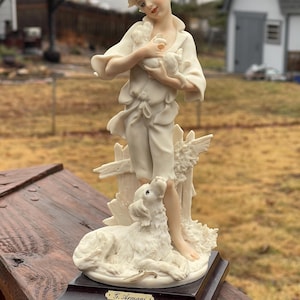 Giuseppe Armani&#39;s &#39;Tenderness boy with puppy&#39;