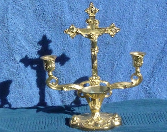 brass alter crucifix , candle holder and holy water cup