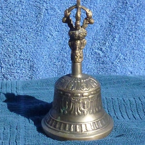 bronze alter bell with Asian face