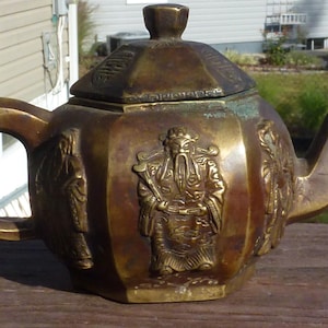 Immortals bronze teapot