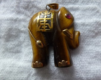 Tiger eye stone with 14 k gold