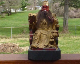Wood carving of Qing emperor