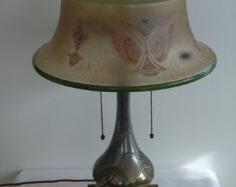 Pairpoint lamp with stylized owl face glass shade